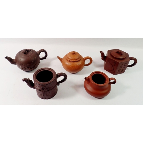 169 - A group of five various Chinese Yishin teapots