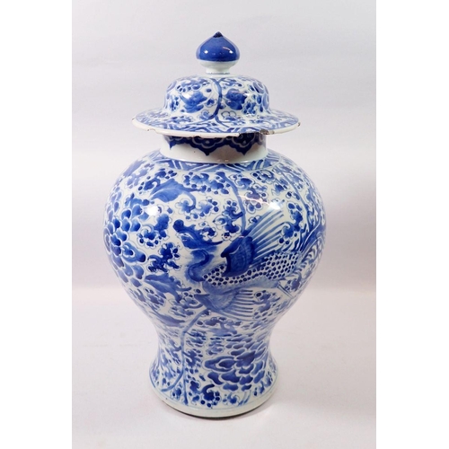 172 - A Qing Dynasty Chinese blue and white baluster vase and cover painted birds and flowers, 41cm