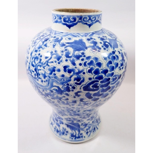 172 - A Qing Dynasty Chinese blue and white baluster vase and cover painted birds and flowers, 41cm