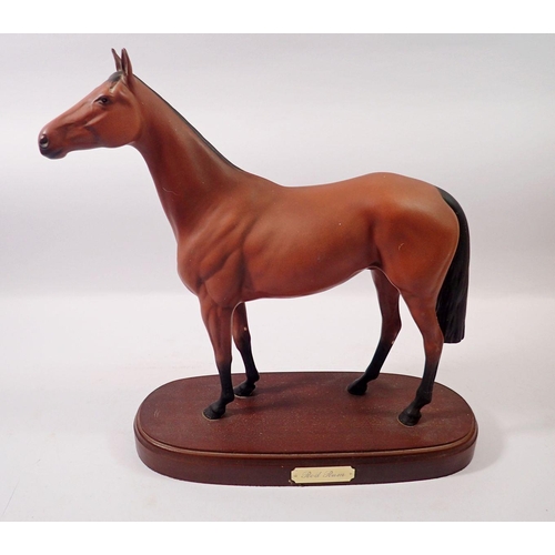 174 - A Royal Doulton horse 'Red Rum' on plinth, 33cm height