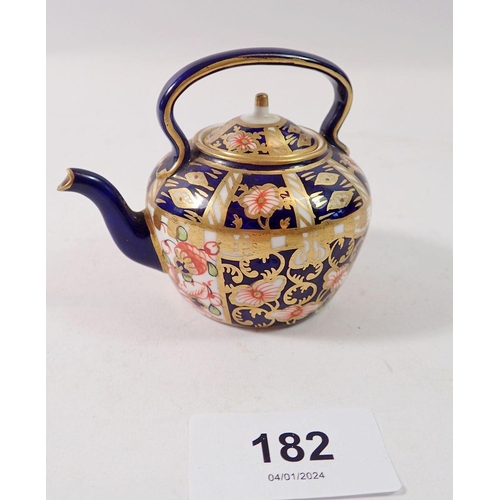 182 - A Royal Crown Derby miniature tea kettle, 6.5cm tall