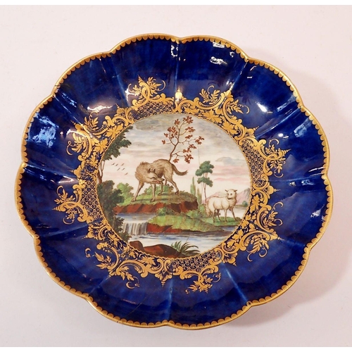 192 - An early Worcester saucer painted by Jefferyes Hamett O'Neale depicting The Wolf and The Lamp from A... 