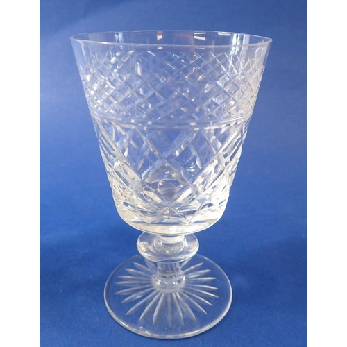 216 - A set of five cut glass bucket form wine glasses