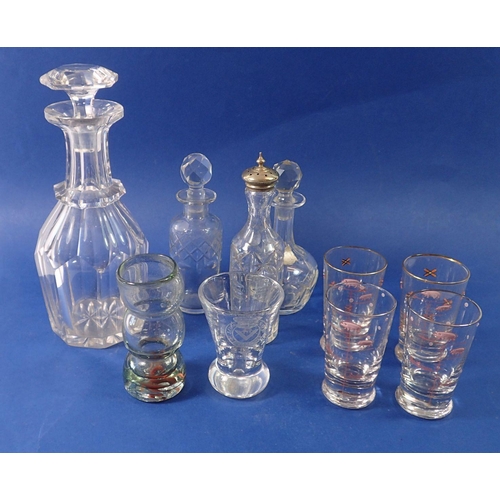 222 - A cut glass decanter, four novelty pig ladies and gentlemen drinks measures and three other cut glas... 