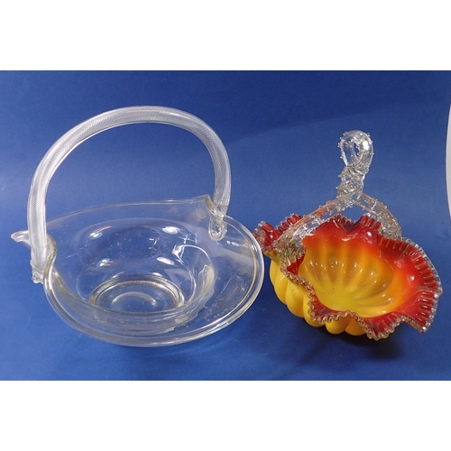 224 - A Victorian frilled orange and yellow glass basket and a clear glass one with air twist handle, 27 x... 