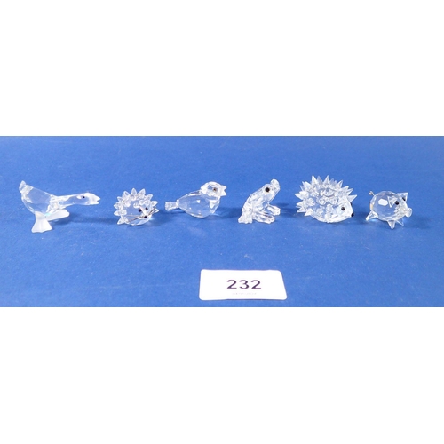 232 - A group of Swarovski glass anamls: goose, hedgehog 4cm, frog, pig, hedgehog, 25cm - all boxed