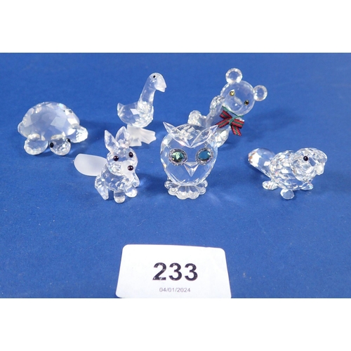 233 - A group of Swarovski glass animals: tortoise, owl, parrot, teddy, goose and fox - all boxed