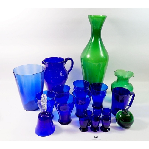 242 - A group of Bristol blue glassware including water jug and six tumblers plus various green glass