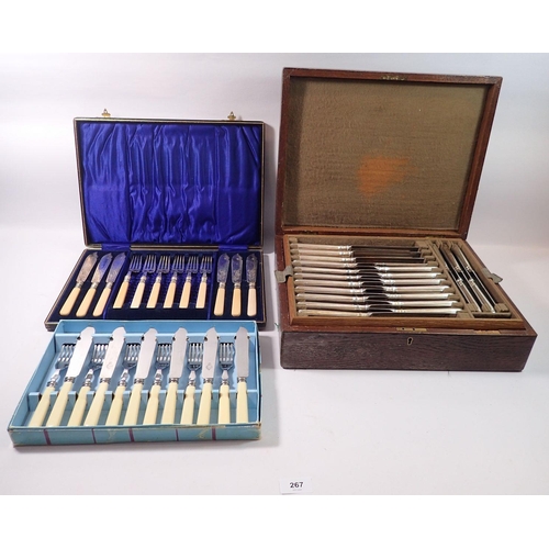 267 - A silver plated set of eighteen dinner knives and two dessert knives and carving set, boxed plus two... 