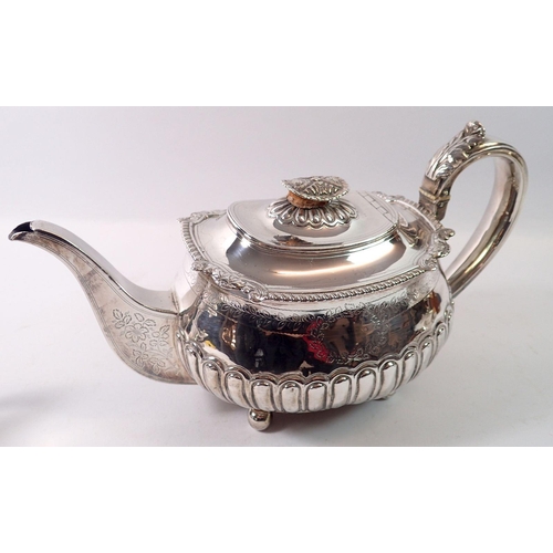 276 - An early 19th century matched silver tea set with scrollwork border and halfgadrooned base, London 1... 