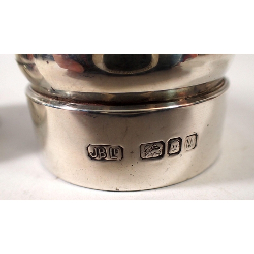 281 - A pair of silver salt and pepper grinders, London 1995 & 1996, John Bull Ltd.