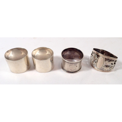 285 - A pair of silver napkin rings, Sheffield 1920 and two others, 155g