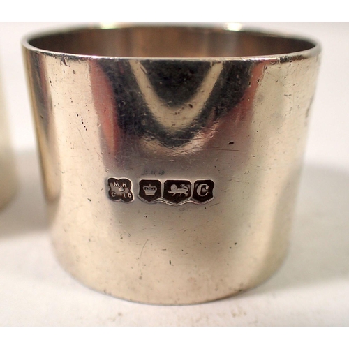 285 - A pair of silver napkin rings, Sheffield 1920 and two others, 155g