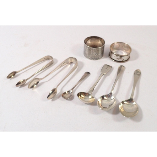 297 - A small group of silver cutlery and two silver napkin rings, 129g