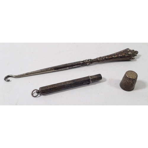 298 - A silver pencil, silver Charles Horner thimble and silver button hook