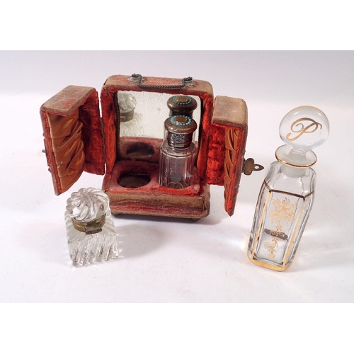 299 - A 19th century glass smelling salts bottle with silver plated and turquoise bead lid in fitted stand... 