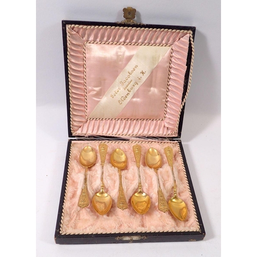 306 - A set of six silver gilt coffee spoons - unmarked