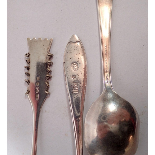 318 - An 18th century Swedish silver spoon and a later silver Swedish spoon plus a sterling 'Treasure' spo... 