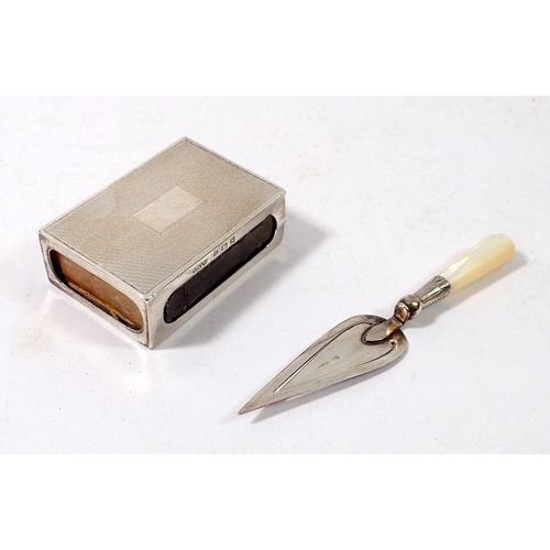 319 - A silver and mother of pearl trowel form book mark, 10cm and a silver matchbox cover, Birmingham 193... 