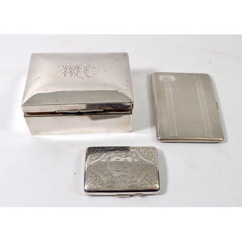 321 - A silver clad cigarette box and two silver cigarette cases, cases 258g