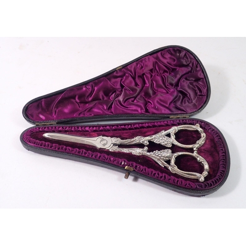 330 - A pair of silver grape scissors with cast vine decoration, cased, 130g, London 1893 by William Hutto... 