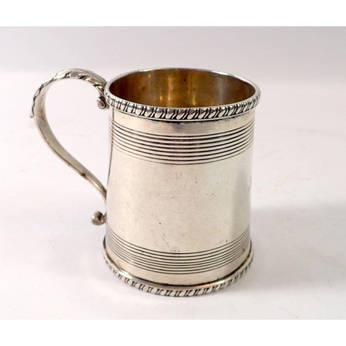 331 - An early 19th century Colonial silver child's mug with reeded decoration, circa 1820 by T & Co, 233g... 