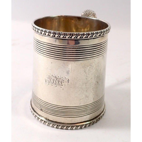 331 - An early 19th century Colonial silver child's mug with reeded decoration, circa 1820 by T & Co, 233g... 