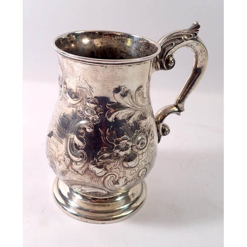 333 - A 19th century Colonial large embossed two pint silver tankard,  circa 1860 by ON & Co. 823g, 19cm t... 