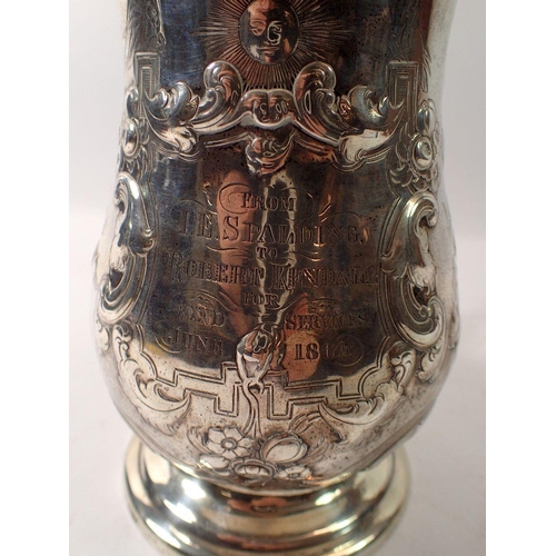 333 - A 19th century Colonial large embossed two pint silver tankard,  circa 1860 by ON & Co. 823g, 19cm t... 