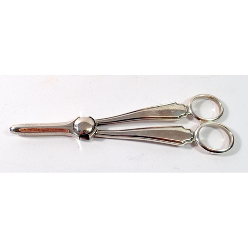 338 - A pair of silver grape scissors, 120g, Sheffield 1934 by Brook & Sons