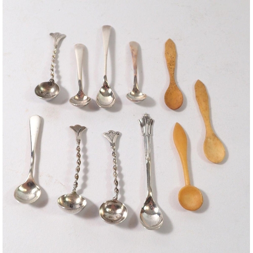 351 - A set of three Victorian silver spiral stem salt spoons, five other cruet spoons, two bone and one h... 