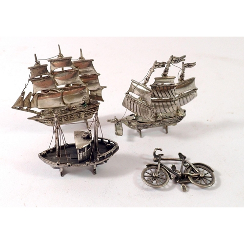 355 - Two miniature Italian white metal sailing ships with movable sails, a fishing boat and a bicycle, bi... 