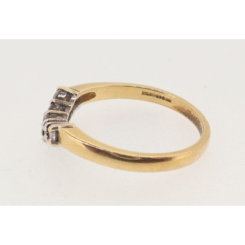 366 - An 18 carat gold ring set curved line of five diamonds, size P, 3.2g