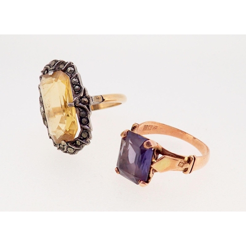 371 - A gold ring set amethyst with Egyptian marks for 18ct, 1.8g, size M and a citrine and marcasite ring... 