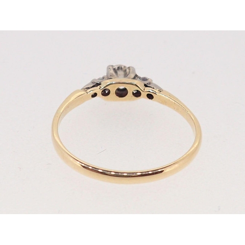 373 - An Edwardian 18 carat gold three stone diamond ring, 1.8g, size M to N