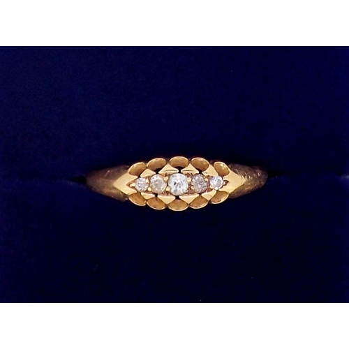 380 - An 18 carat gold ring set five graduated diamonds, size M, 2g