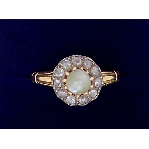 381 - An antique unmarked gold ring set diamond and pale green stone cluster, size P, tested as 18ct gold