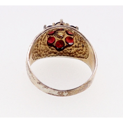 383 - A vintage silver gilt ring set opal and garnets, size P