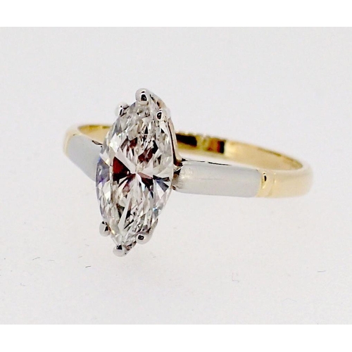 402 - An 18 carat gold and platinum set marquise cut diamond ring, approximately one carat, size L, boxed