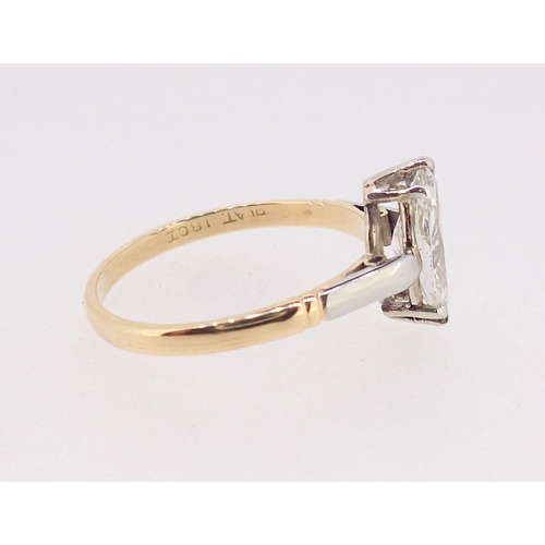 402 - An 18 carat gold and platinum set marquise cut diamond ring, approximately one carat, size L, boxed