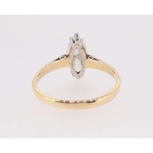 402 - An 18 carat gold and platinum set marquise cut diamond ring, approximately one carat, size L, boxed