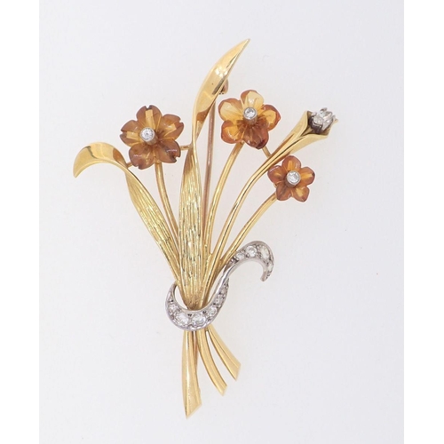 405 - An 18 carat gold flower spray brooch with carved citrine flowers set diamonds, 6cm, 12g