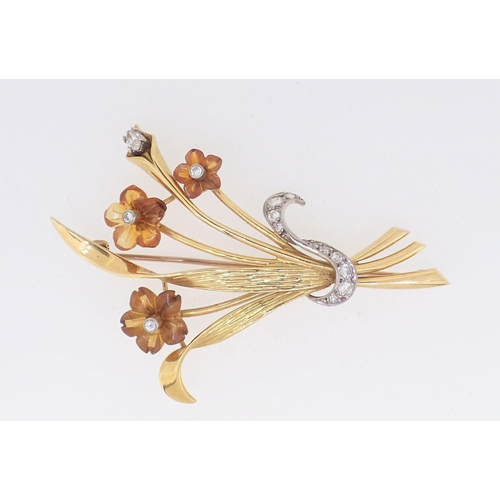 405 - An 18 carat gold flower spray brooch with carved citrine flowers set diamonds, 6cm, 12g