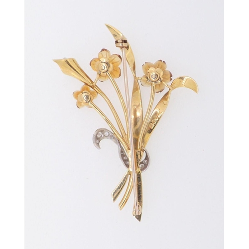 405 - An 18 carat gold flower spray brooch with carved citrine flowers set diamonds, 6cm, 12g