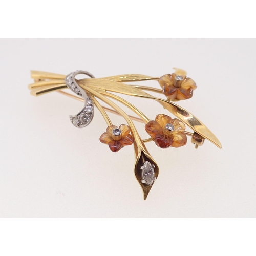 405 - An 18 carat gold flower spray brooch with carved citrine flowers set diamonds, 6cm, 12g