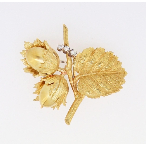 409 - An 18 carat gold Copp & Farr nut and leaf brooch set three diamonds, marked C&F, 22.5g, 4.5 x 4cm