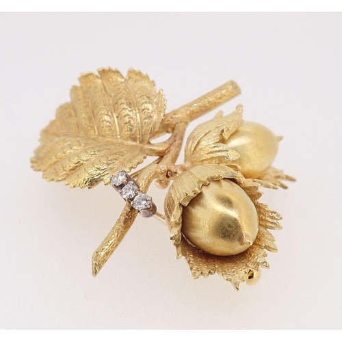 409 - An 18 carat gold Copp & Farr nut and leaf brooch set three diamonds, marked C&F, 22.5g, 4.5 x 4cm