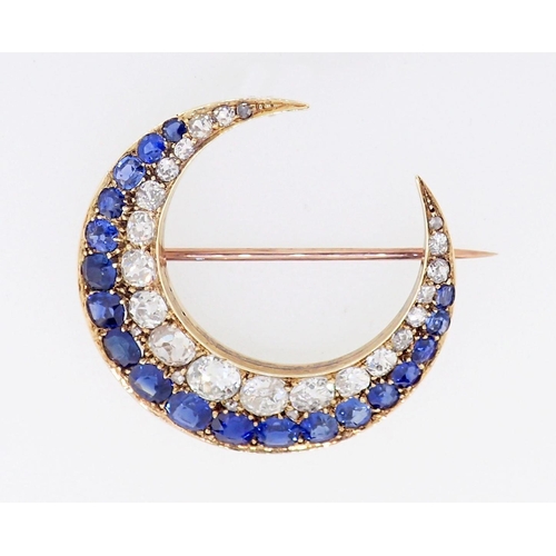 410 - A fine 18 carat gold crescent moon brooch set graduated sapphires and diamonds, 3.8 x 3.6cm, the lar...