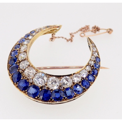 410 - A fine 18 carat gold crescent moon brooch set graduated sapphires and diamonds, 3.8 x 3.6cm, the lar... 