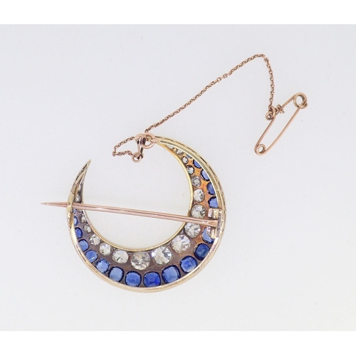 410 - A fine 18 carat gold crescent moon brooch set graduated sapphires and diamonds, 3.8 x 3.6cm, the lar... 